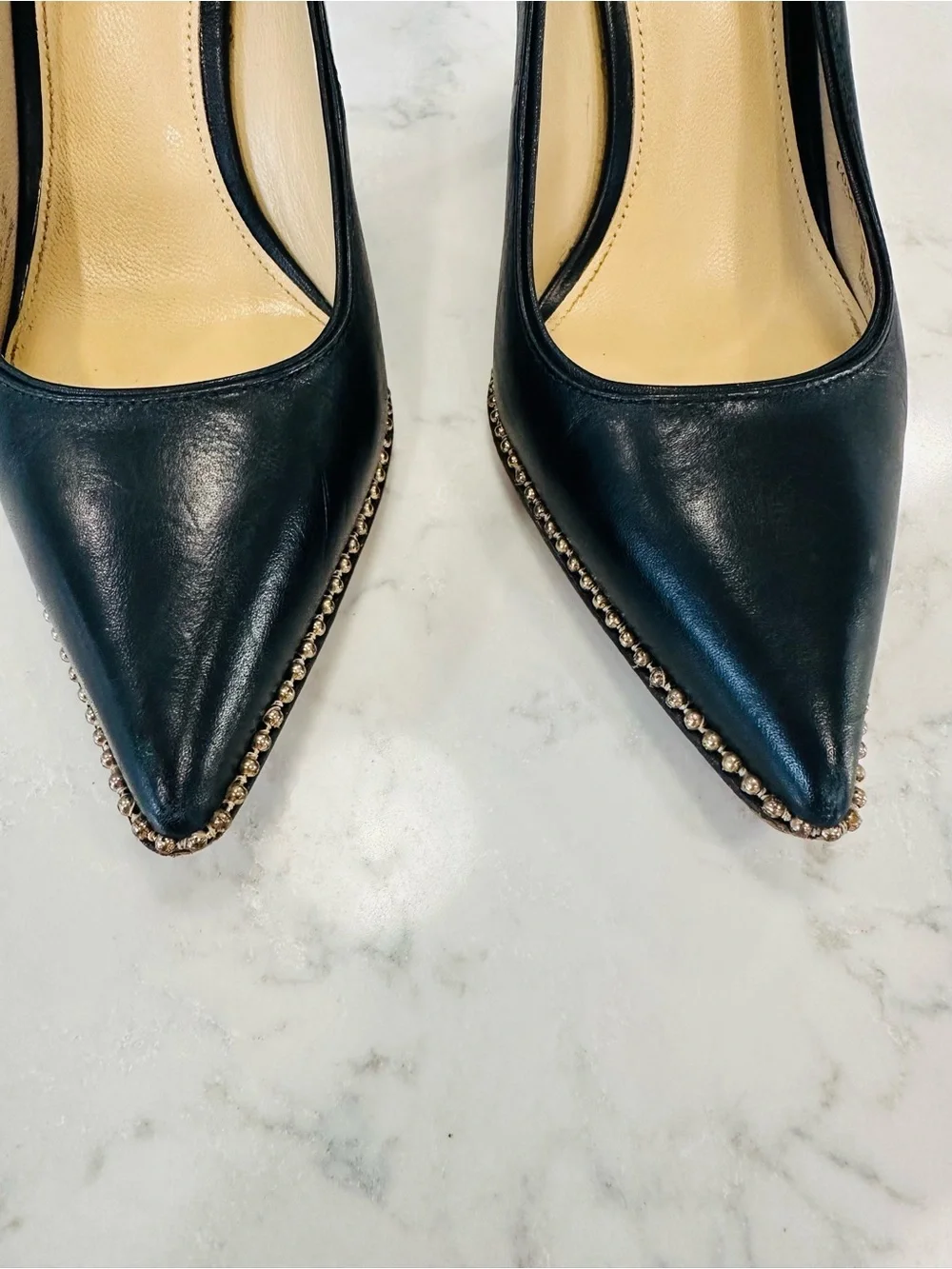 Coach Tamera Black Leather Pointed Toe Pumps with Gold Beaded Accent
